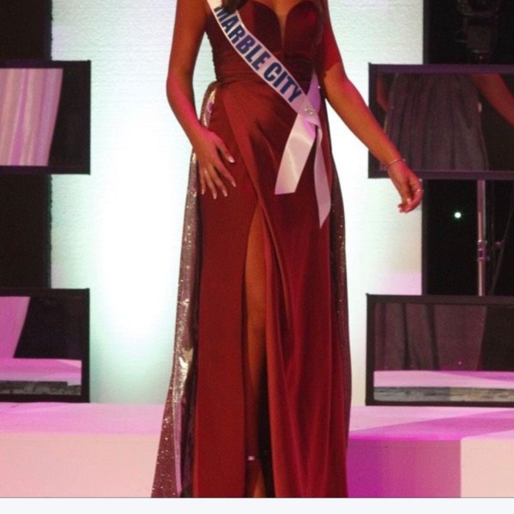 Custom LaFemme maroon dress with silver train